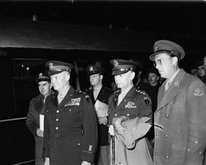 General Dwight D. Eisenhower arriving in Amsterdam during a visit to the Netherlands, with his chief of staff General Walter Bedell Smith, and Prince Bernhard, 6 October 1945